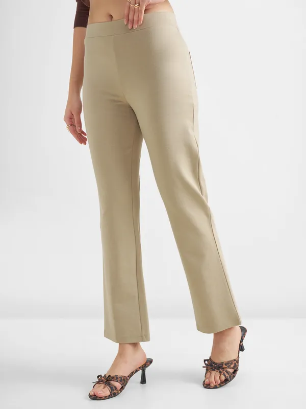 Tokyo Talkies Women Tan Solid Bootcut Regular Trouser