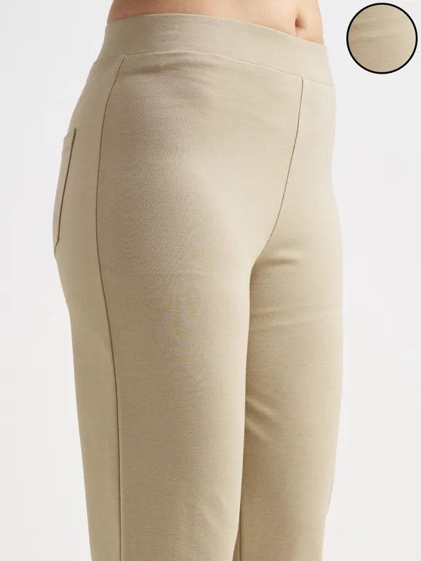 Tokyo Talkies Women Tan Solid Bootcut Regular Trouser