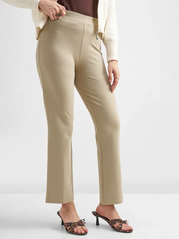 Tokyo Talkies Women Tan Solid Bootcut Regular Trouser