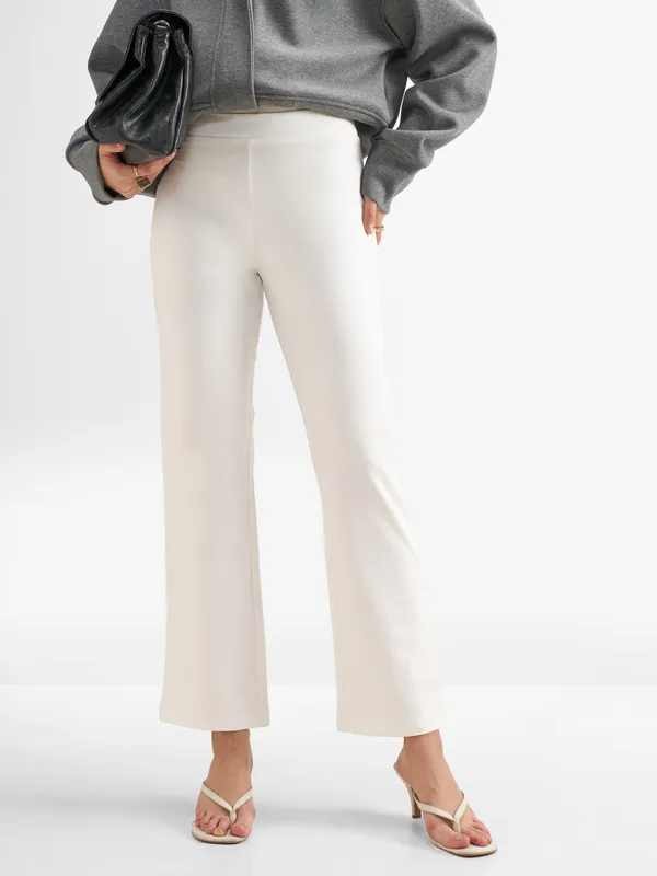 Tokyo Talkies Women White Solid Bootcut Regular Trouser