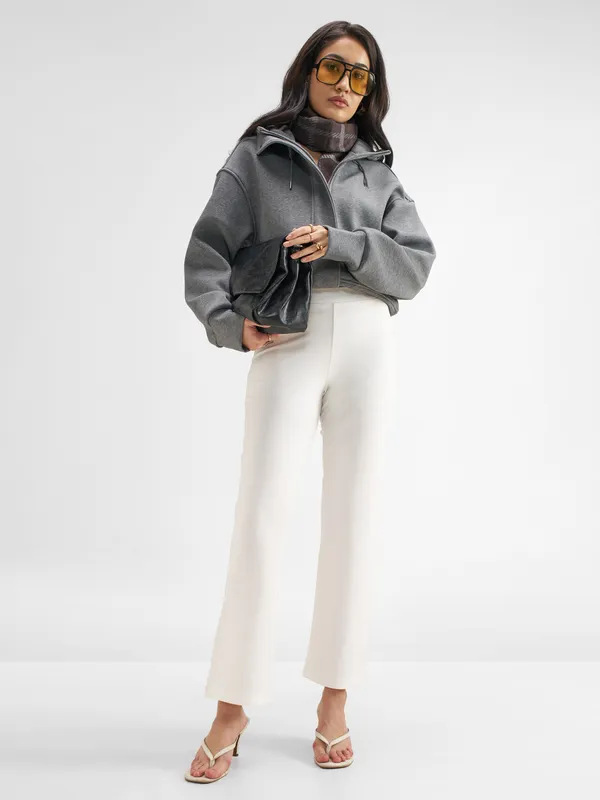 Tokyo Talkies Women White Solid Bootcut Regular Trouser