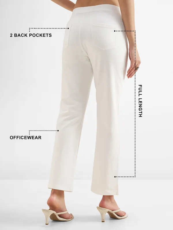 Tokyo Talkies Women White Solid Bootcut Regular Trouser