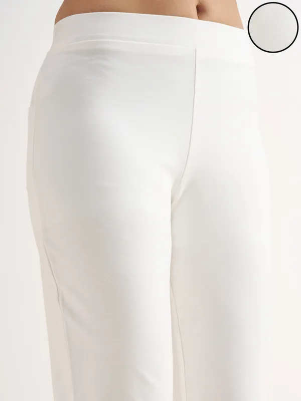 Tokyo Talkies Women White Solid Bootcut Regular Trouser