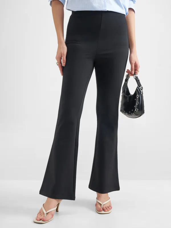 Tokyo Talkies Women Black Solid Bootcut Regular Trouser