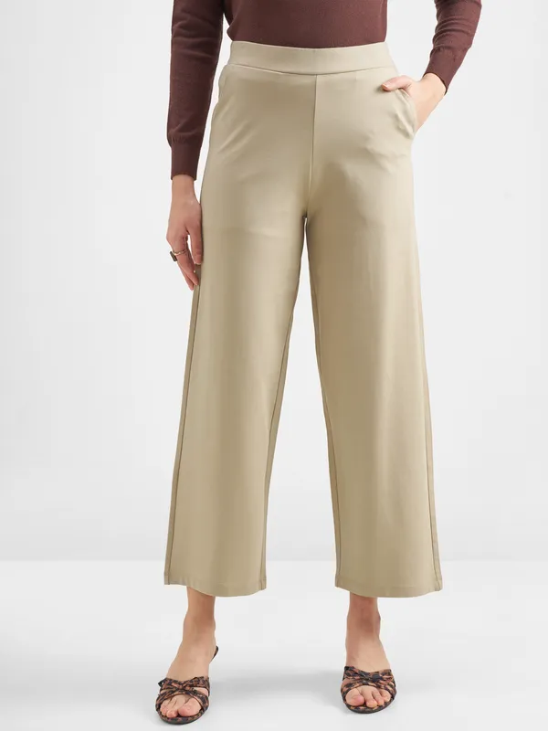 Tokyo Talkies Women Beige Solid Wide Leg Regular Trouser