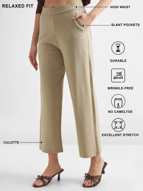 Tokyo Talkies Women Beige Solid Wide Leg Regular Trouser