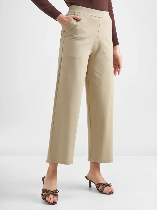 Tokyo Talkies Women Beige Solid Wide Leg Regular Trouser