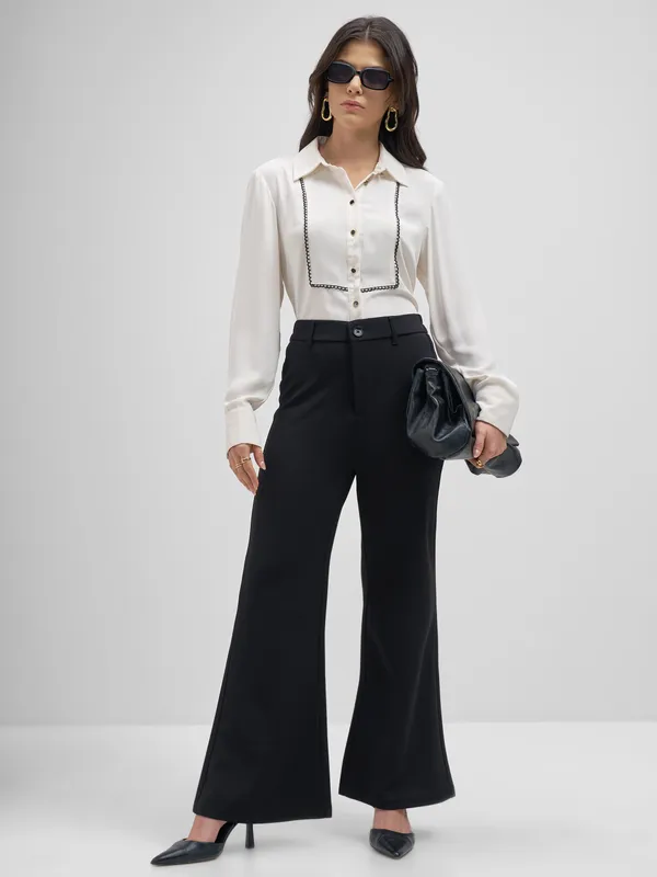 Tokyo Talkies Women Black Solid Bootcut Regular Trouser