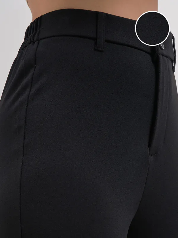 Tokyo Talkies Women Black Solid Bootcut Regular Trouser
