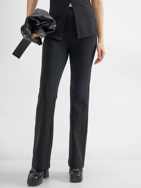 Tokyo Talkies Women Black Solid Bootcut Regular Trouser