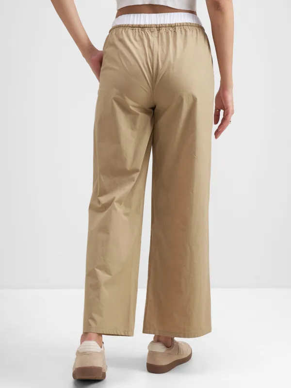Tokyo Talkies Women Beige Solid Straight Fit Regular Trouser