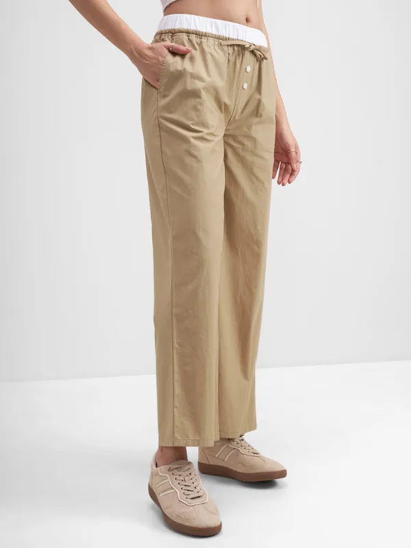 Tokyo Talkies Women Beige Solid Straight Fit Regular Trouser