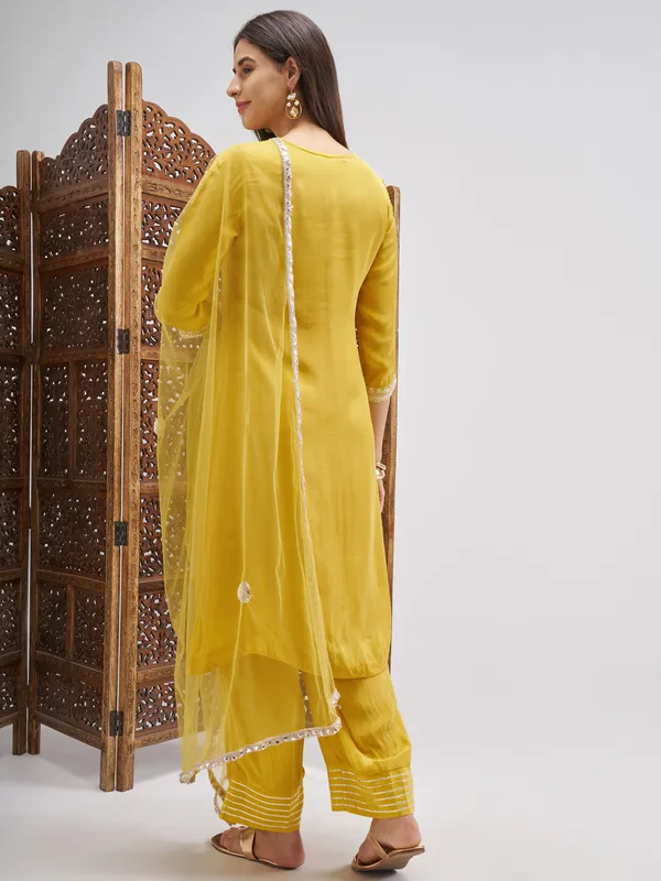 Vishudh Women Mustard Embroidered Kurta And Palazzo With Dupatta