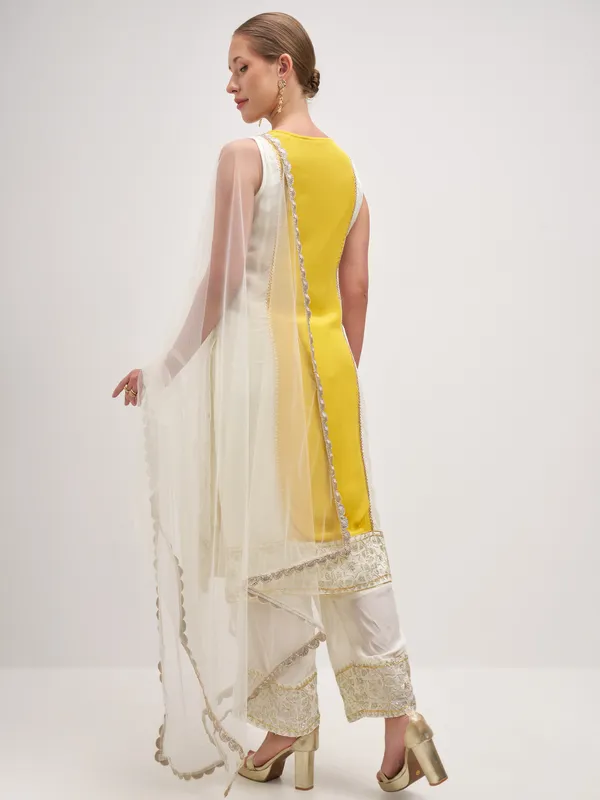 Vishudh Women Yellow Embroidered Kurta And Palazzo With Dupatta