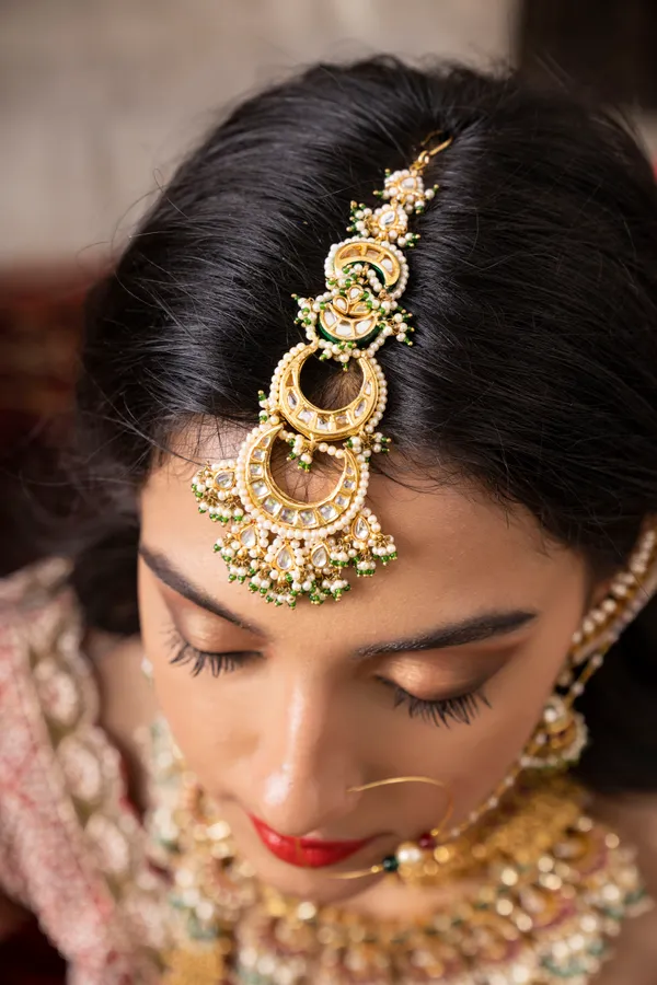 Chandrika Green Hints Gold Maang Tikka