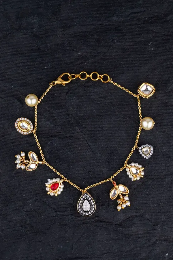 Pearls & Kundan Asymetric Charm Bracelet
