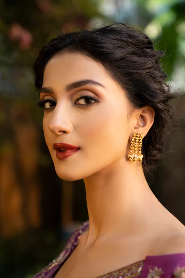 Regal Gold Earrings With Pearls