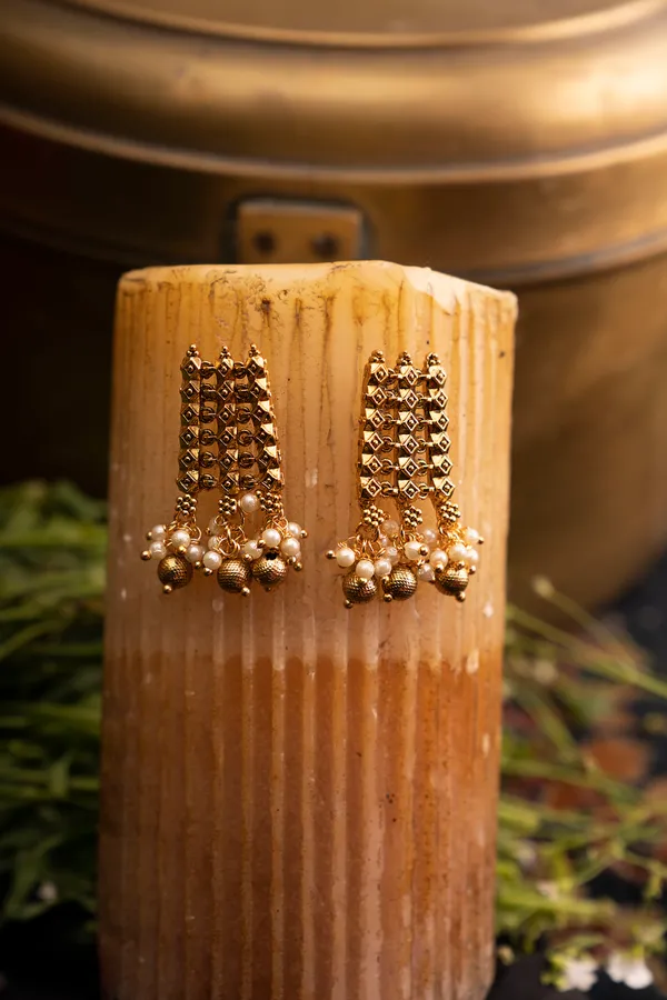 Regal Gold Earrings With Pearls