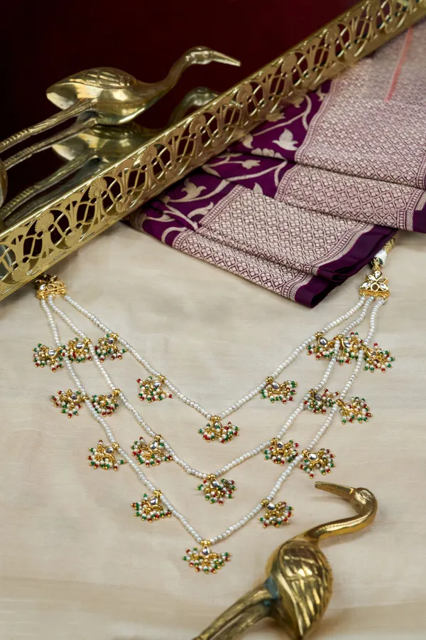 White Kundan Three Line Red & Green Pearls Necklace