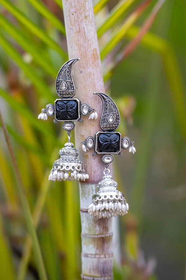 Carved Green Center Silver Finish Jhumki Earrings
