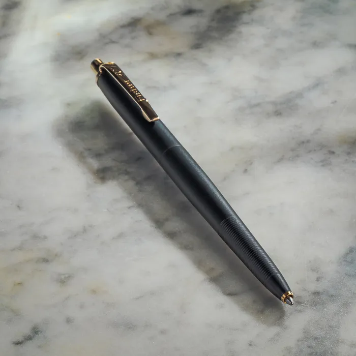 Fisher Space Cerakote Graphite Black with Gold Titanium Nitride Accents Ballpoint pen with Click and release button mechanism
