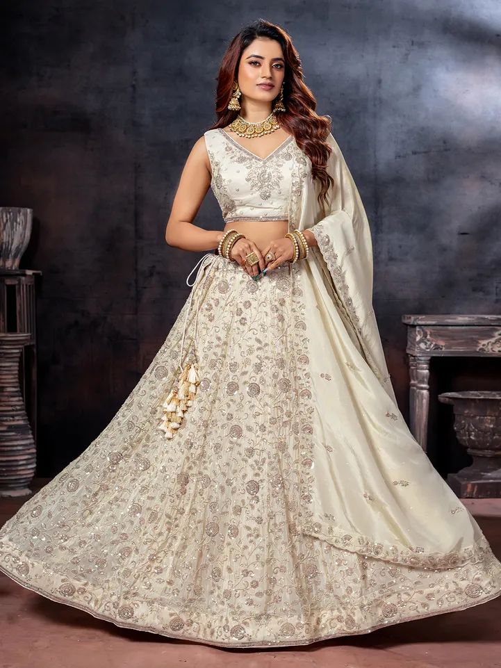 Off White Sleeveless Tissue Silk Lehenga Choli
