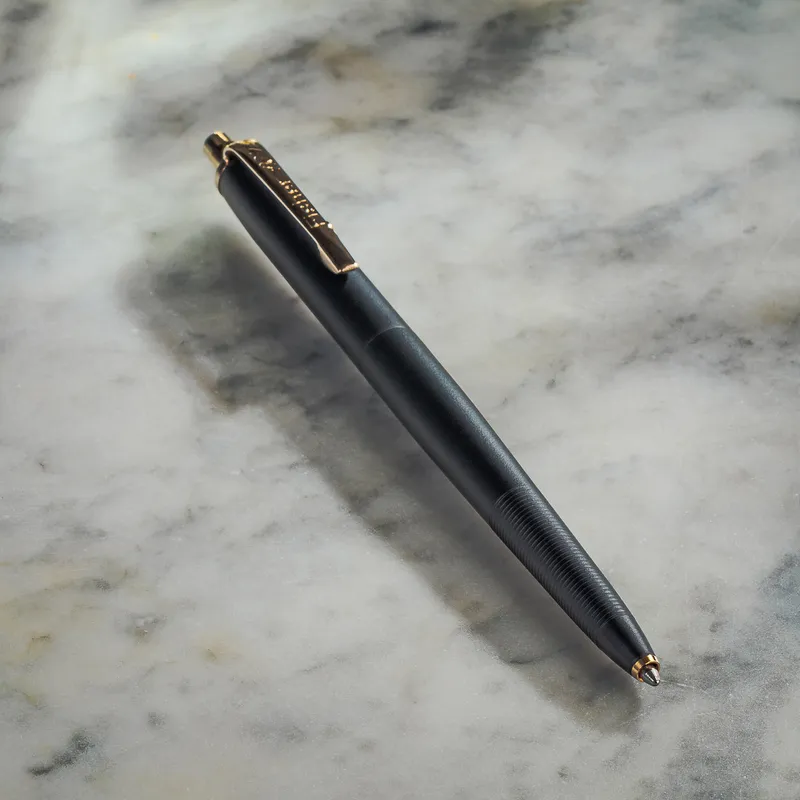 Fisher Space Cerakote Graphite Black with Gold Titanium Nitride Accents Ballpoint pen with Click and release button mechanism