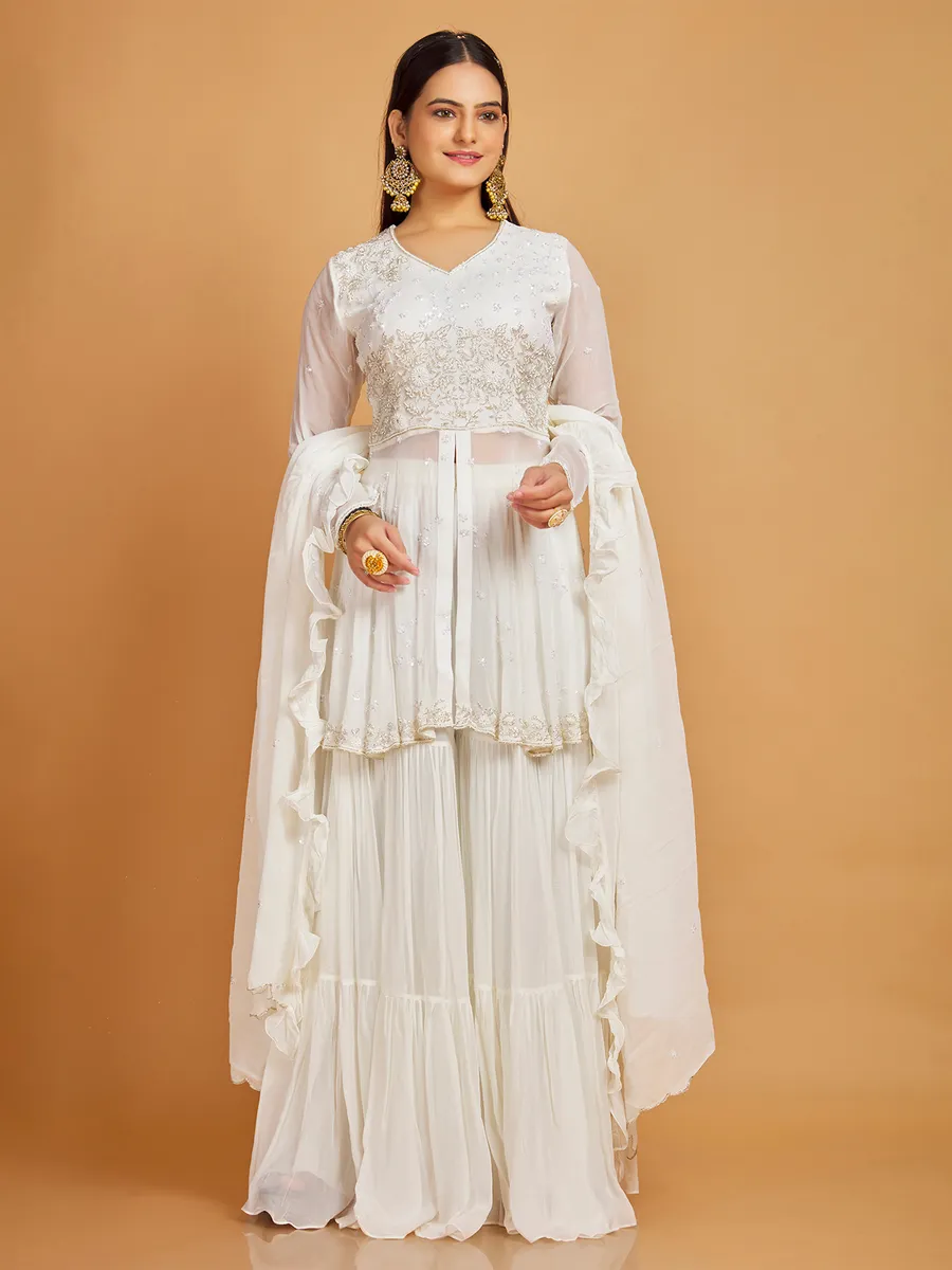 sharara dress Baby Pink Set with Hand Embroidered Floral Design S Crafted in georgette this straight kurta features cut dana and moti detailing with a round neckline and 34th sleeves paired with a flared sharara mid Buy Designer Sharara Dress |