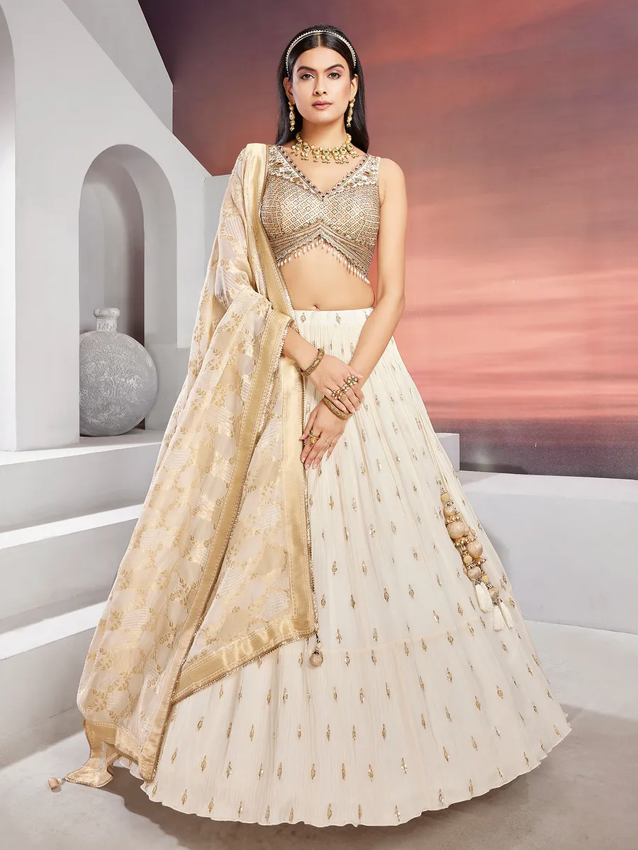 White and gold lehenga choli sales
