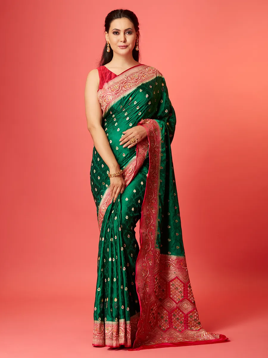 Dark green silk contrast border saree