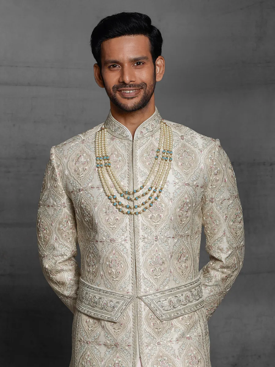 Dual layer silk sherwani in beige color for wedding event