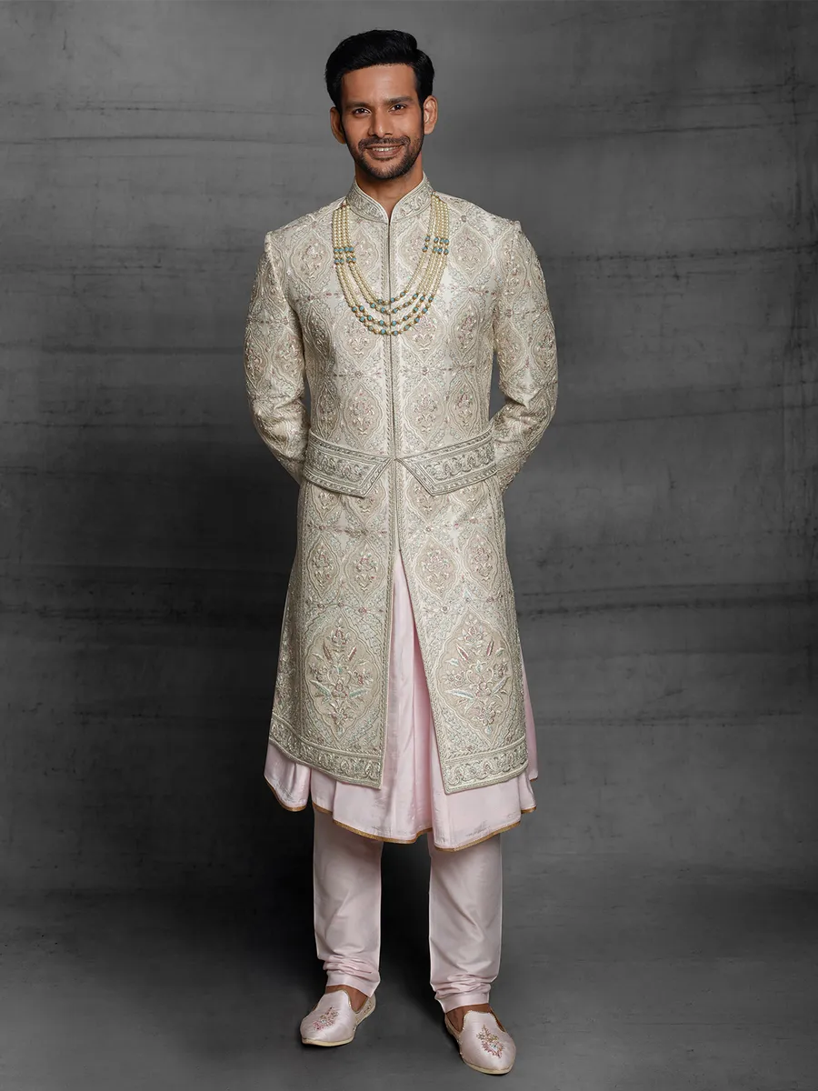 Dual layer silk sherwani in beige color for wedding event