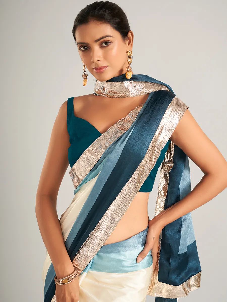 Appealing cream and blue masru silk saree