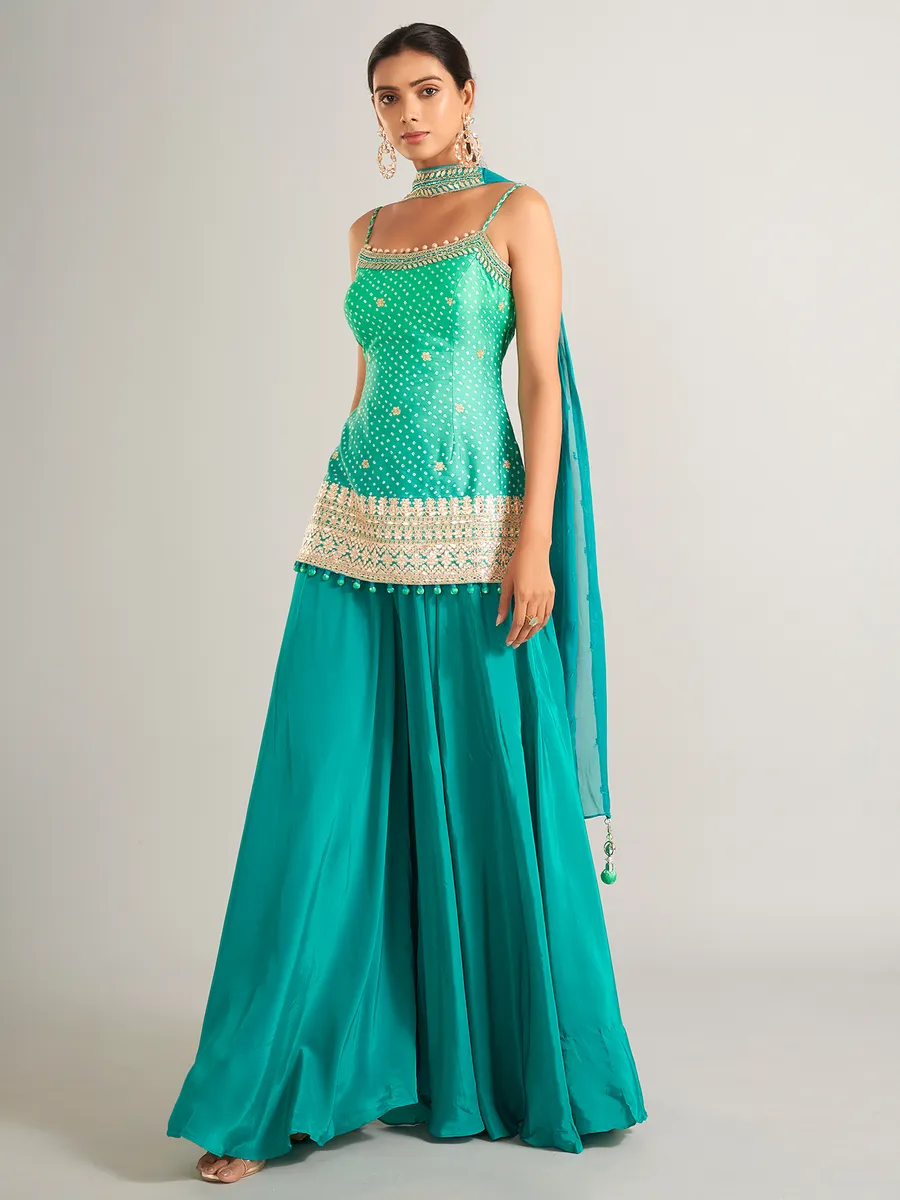 Bandhani print silk rama green palazzo salwar suit