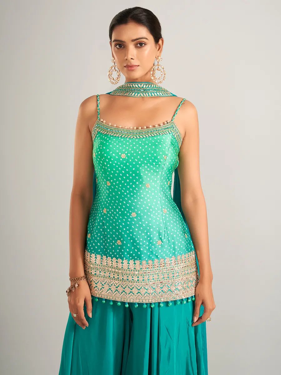 Bandhani print silk rama green palazzo salwar suit