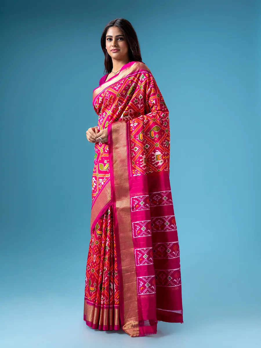Beautiful patola printed magenta saree