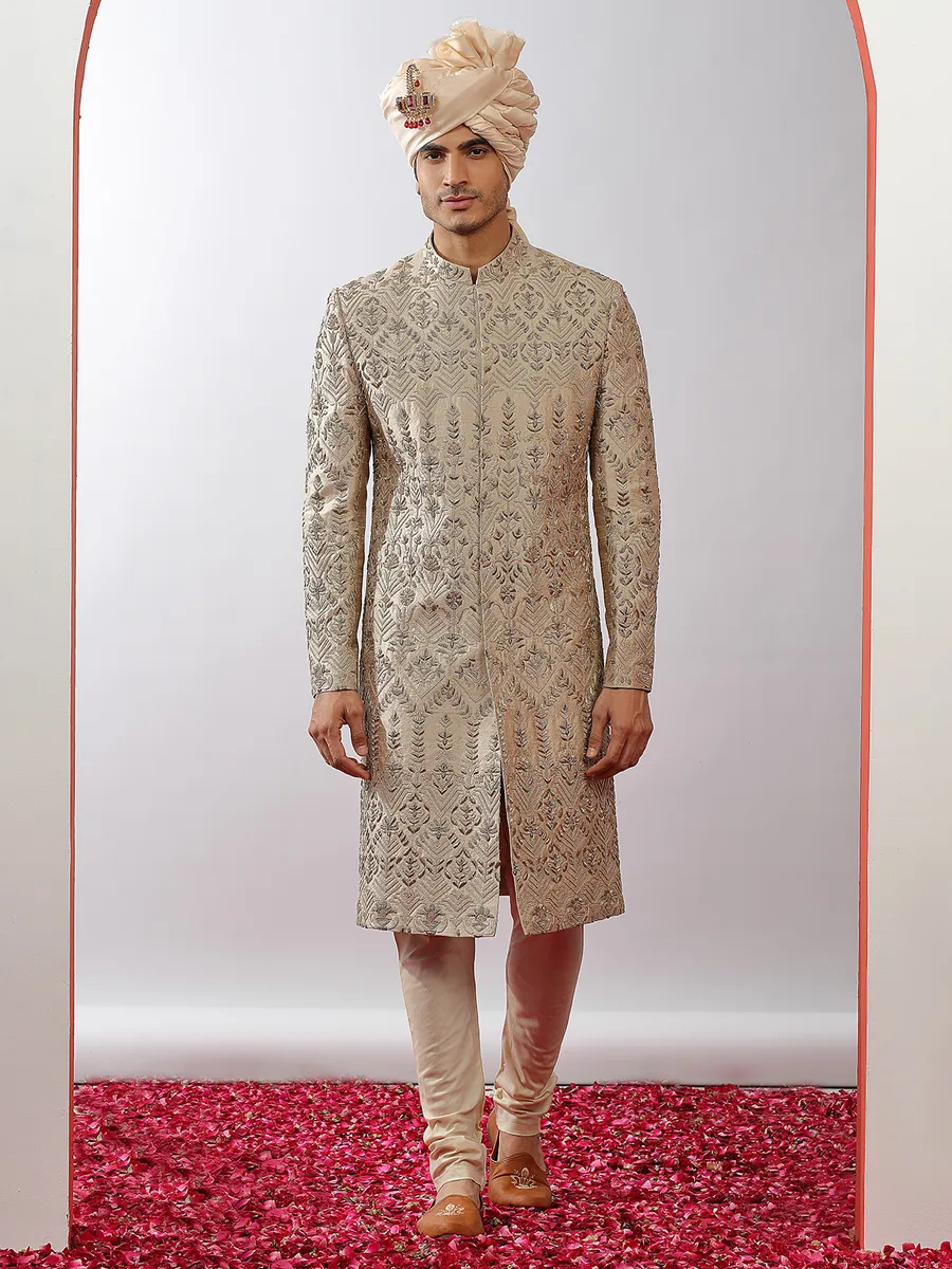 Beige lavish groom wear raw silk sherwani