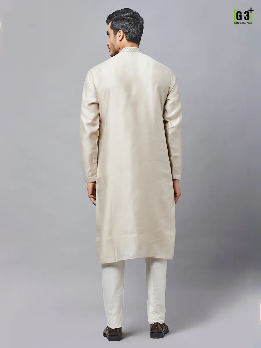 Beige silk kurta set for festive events
