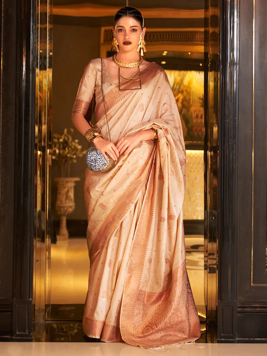 Beige tusser silk saree with zari weaving