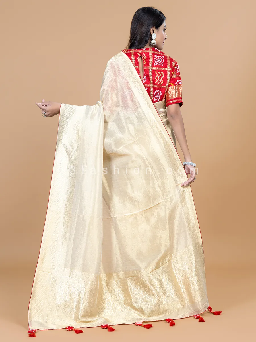 Cream wedding wear tissue silk saree