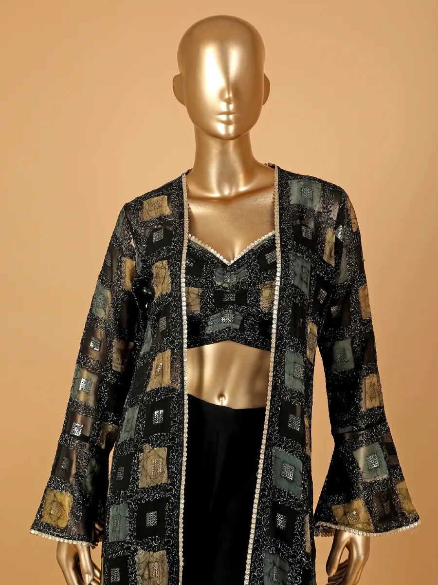 Black palazzo suit with printed shrug