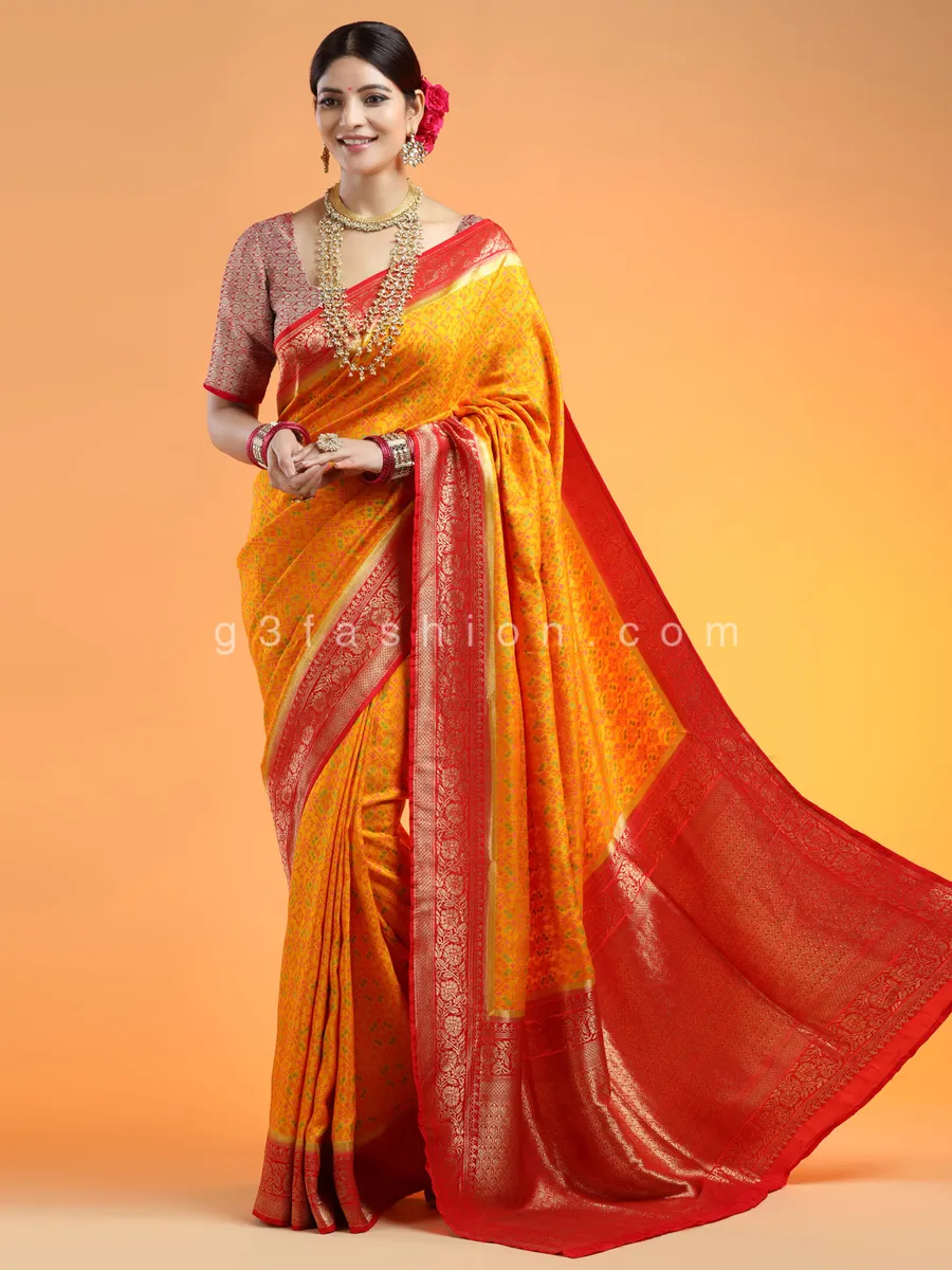 Bright yellow extravagant wedding look saree in silk