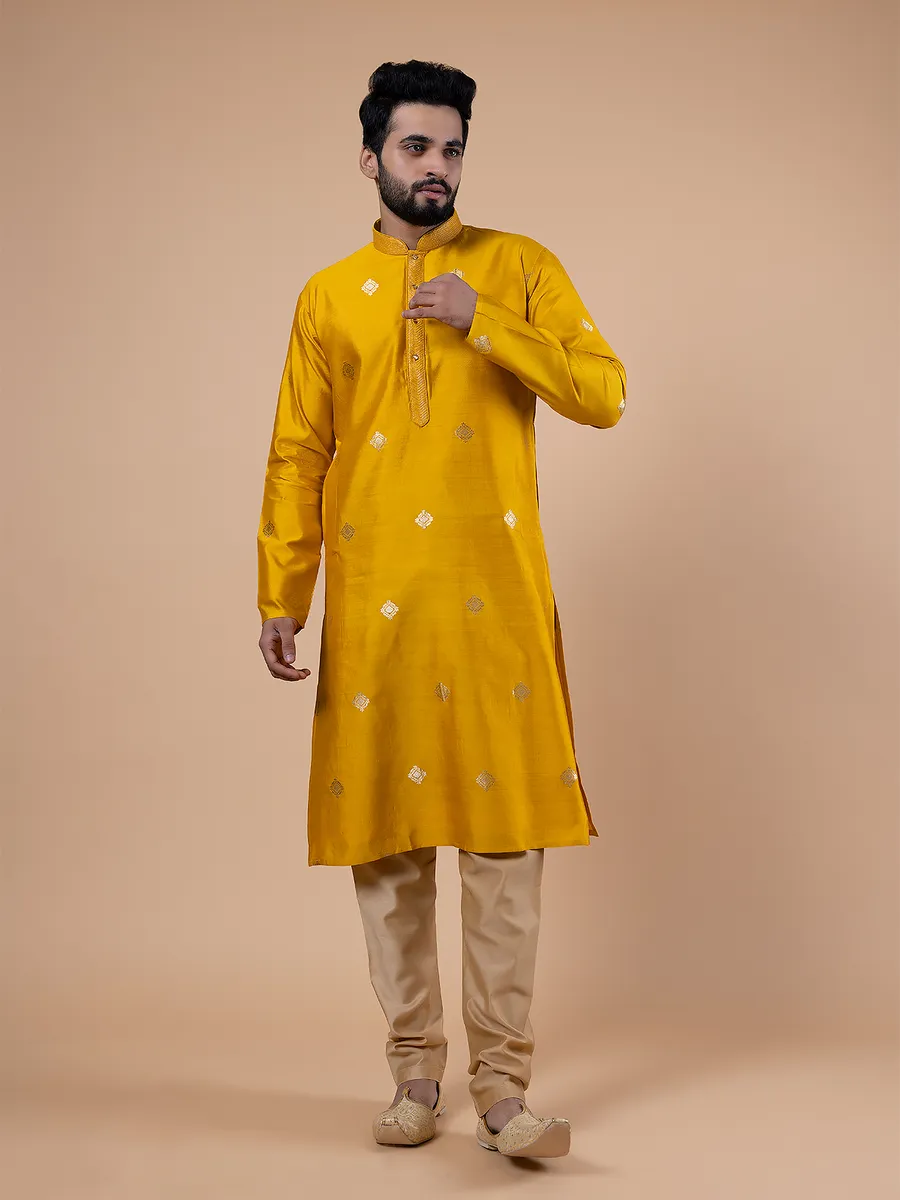 Bright yellow raw silk zari work kurta suit