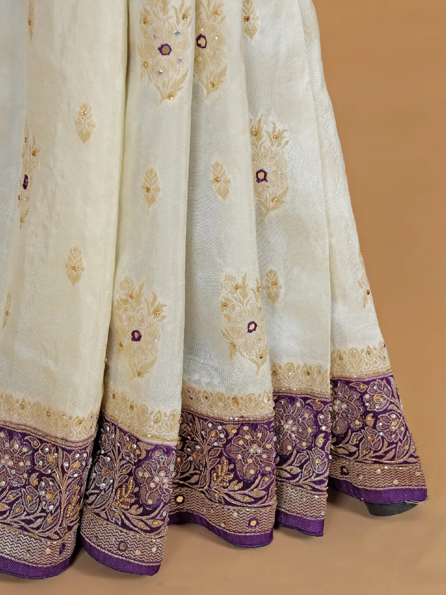 Cream and purple dola silk saree with zari work