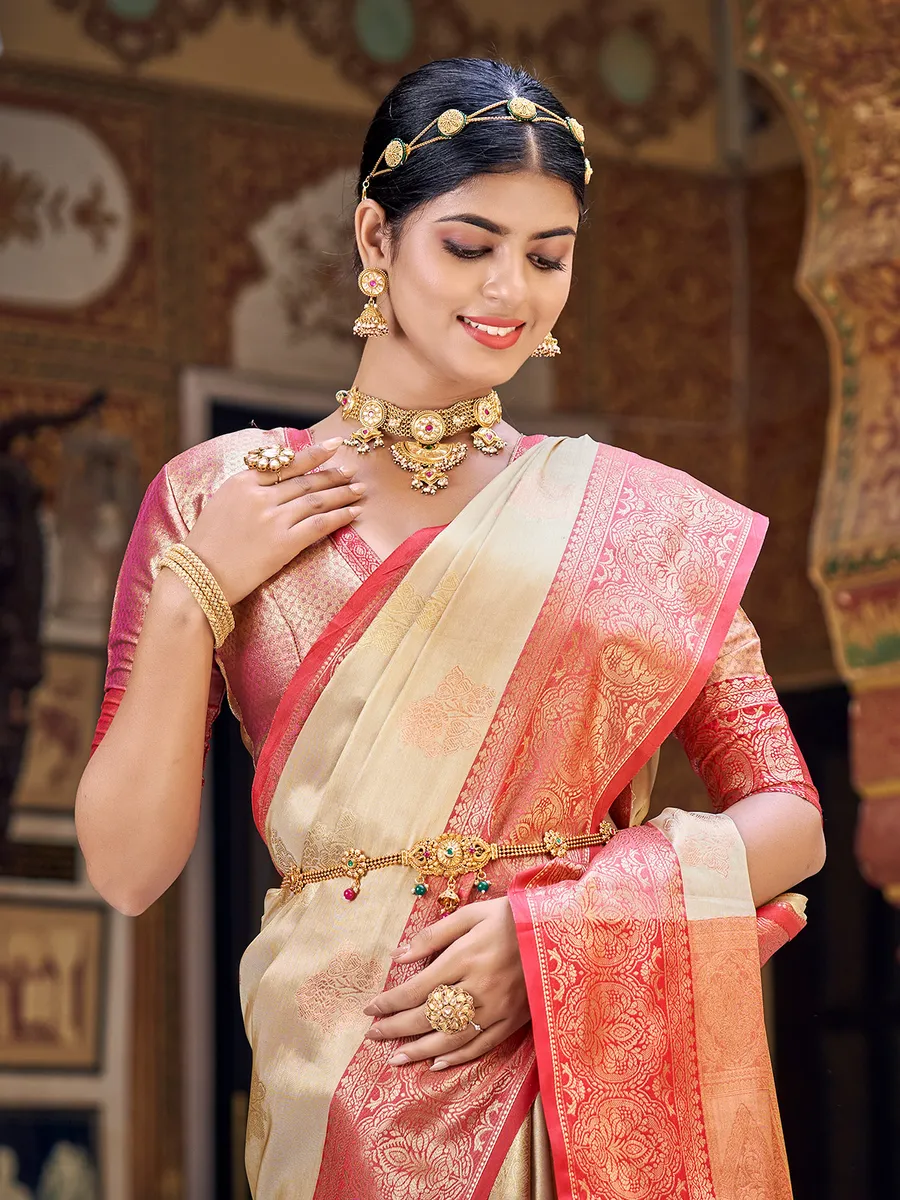 Cream banarasi silk saree with contrast border