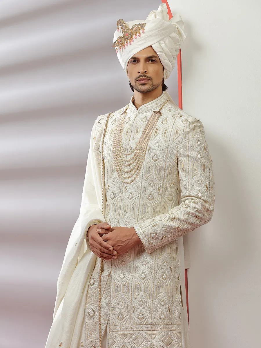 Cream color rich raw silk groom wear sherwani