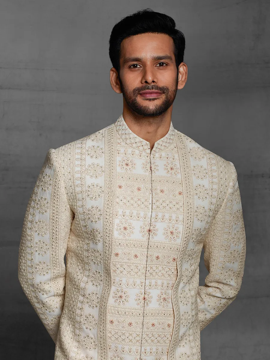 Cream hue silk wedding wear men sherwani