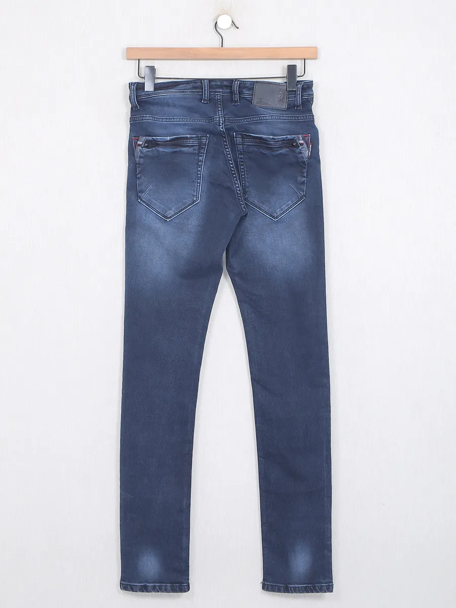 Dark blue colored washed jeans from Nostrum