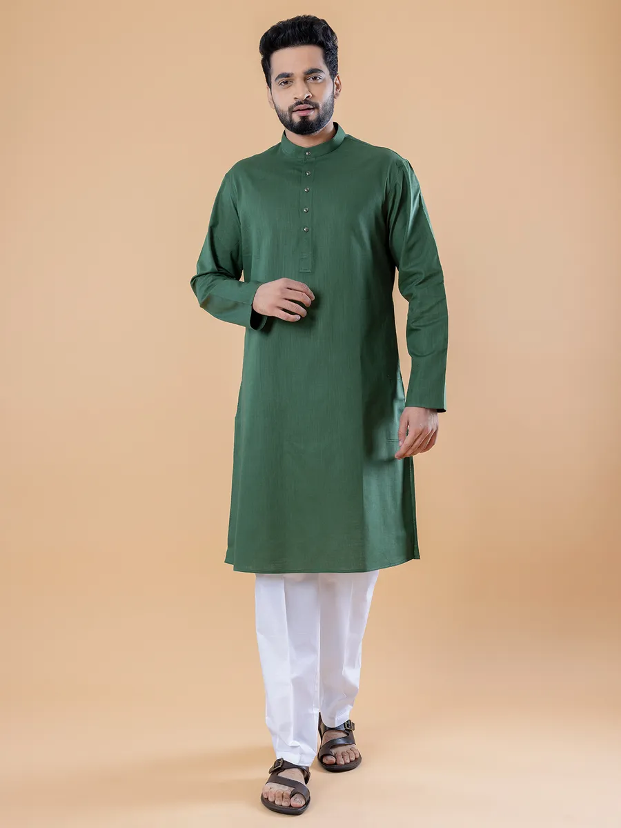 Dark green rich plain cotton kurta suit