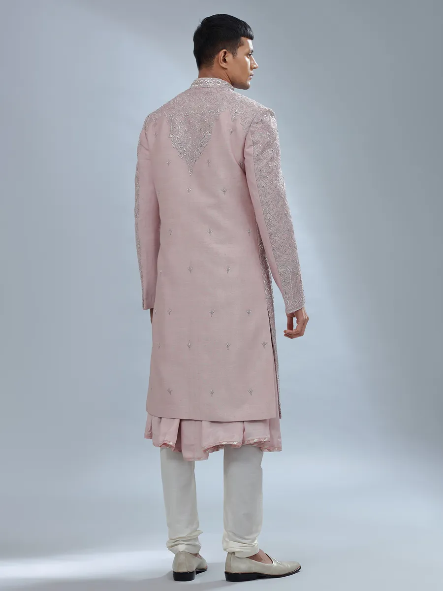 Dark peach peshwai style sherwani for groom